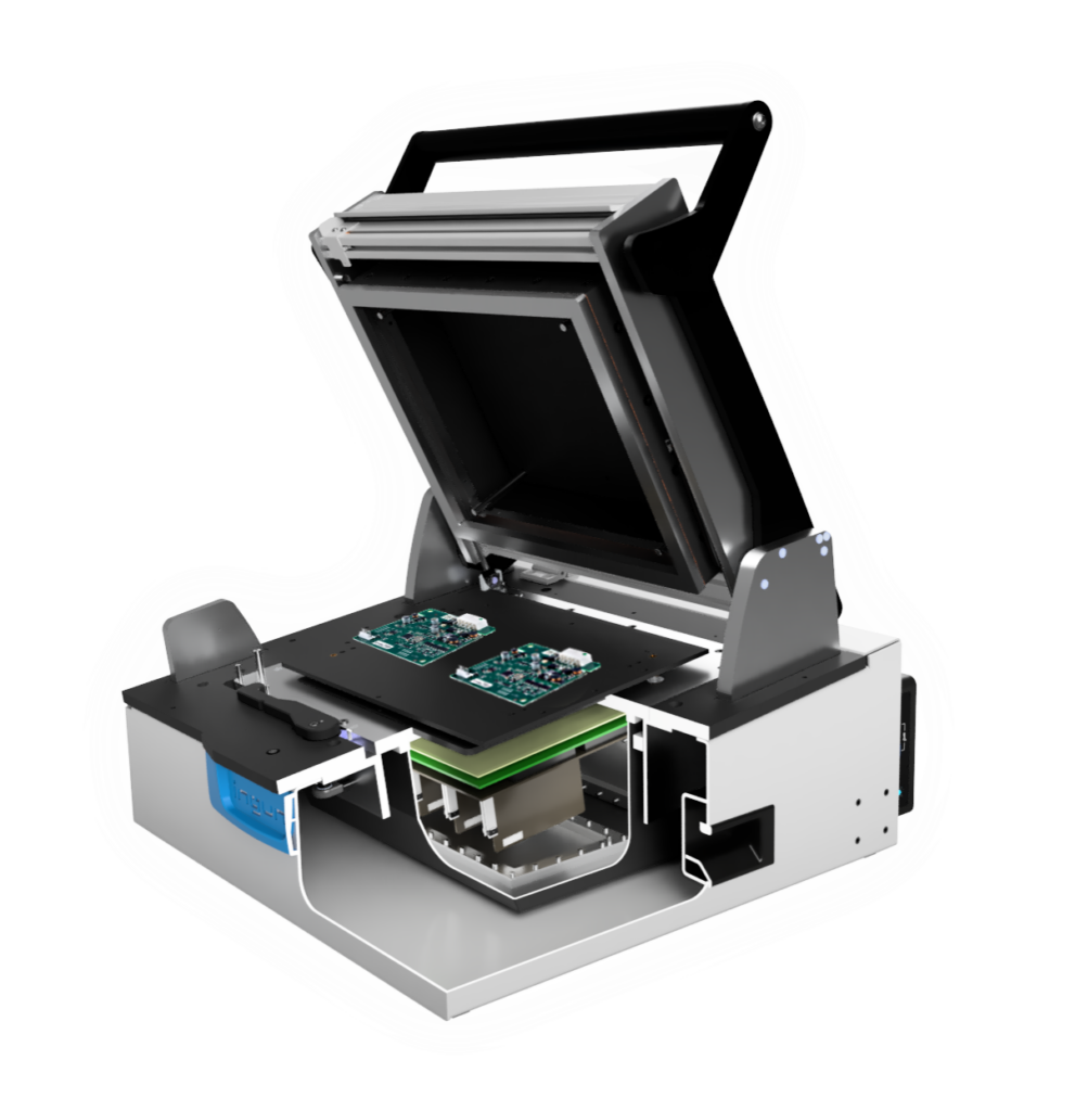 A test fixture featuring an RF enclosure box designed for shielding against external interference, with precision instruments inside for radio frequency testing. The setup showcases the AtoMik® system for electronics production.